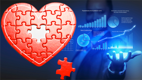 a heart puzzle with a person holding data charts