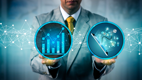 a man holding two circles - one with a bar chart and one with a tablet with data coming out