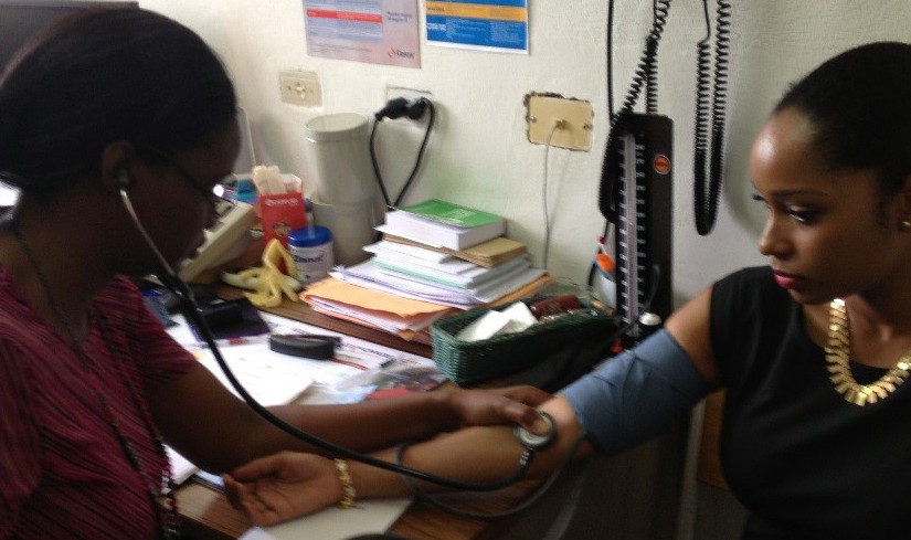 Patient at the Edgar Cochrane Polyclinic in Barbados having her blood pressure taken.
