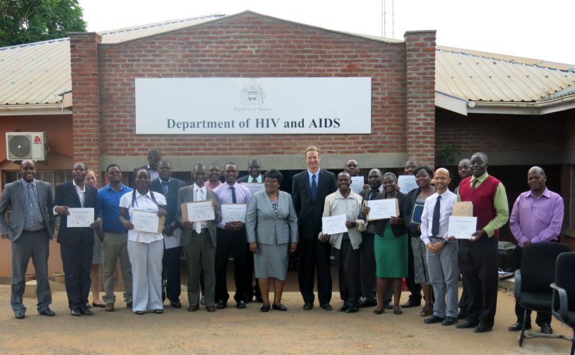 8. Malawi FETP-Frontline Cohort 2 trainees with mentors and guests during graduation ceremony: Photo courtesy: Kiran Bhurtyal, CDC