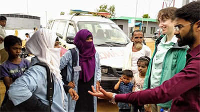 Rachael Zacks interviewing community health workers in Rohingya camp.
