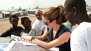 Prior to COVID-19. Nathalie Roberts during an assessment of a camp for internally displaced persons in Port-au-Prince, Haiti, after the January 2010 earthquake. Photo by David Snyder/ CDC Foundation.