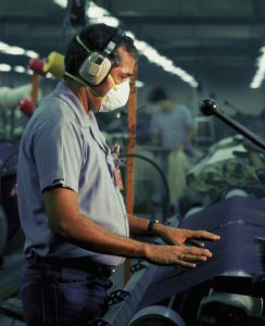 Male worker in textile factory