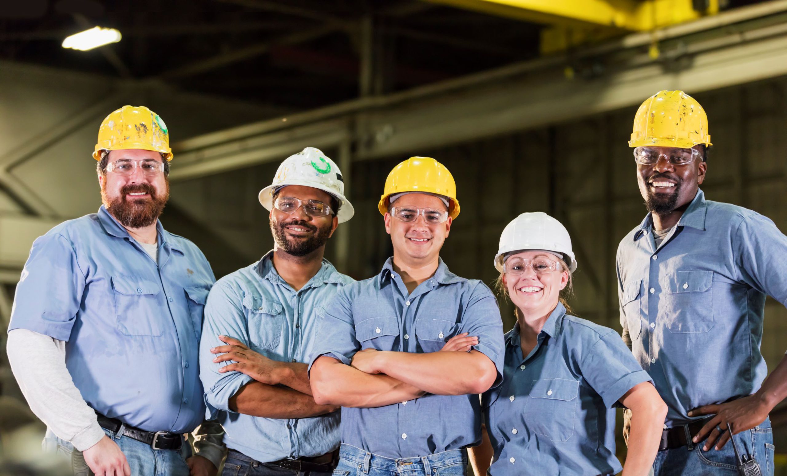 group of workers wearing protective eyewear