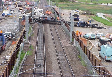 Image of Overturned Drill Rig that fell across nearby railroad tracks.