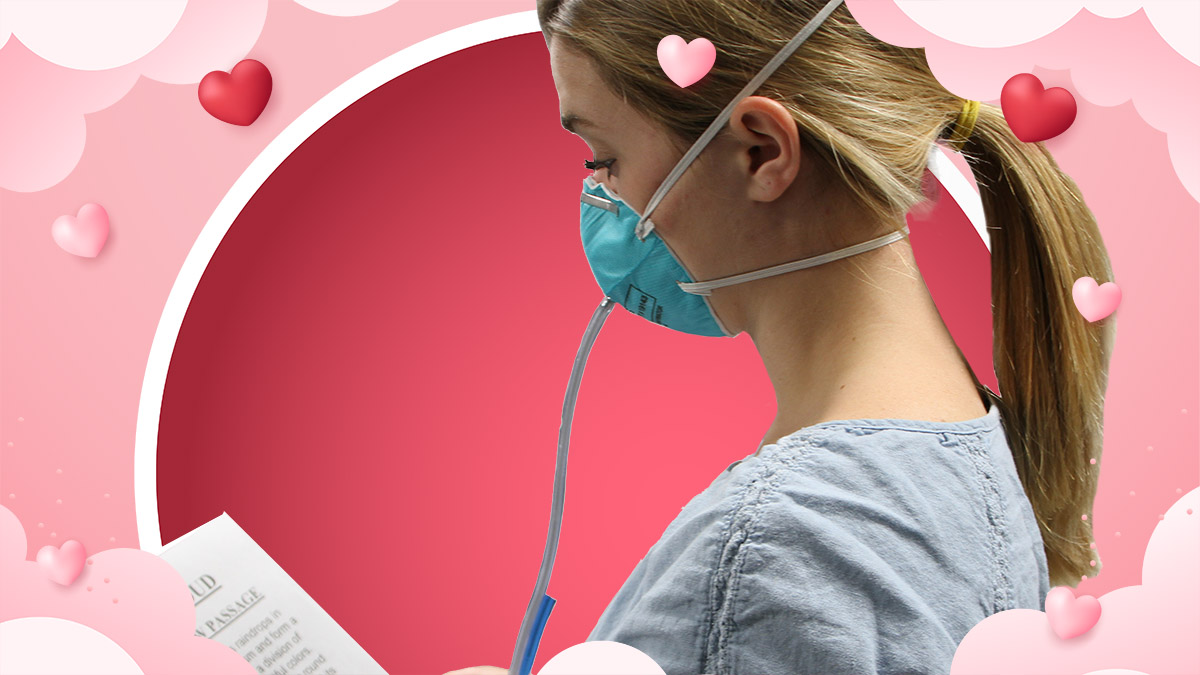 photo of a woman conducting a respirator fit test placed withing a valentine's-themed background