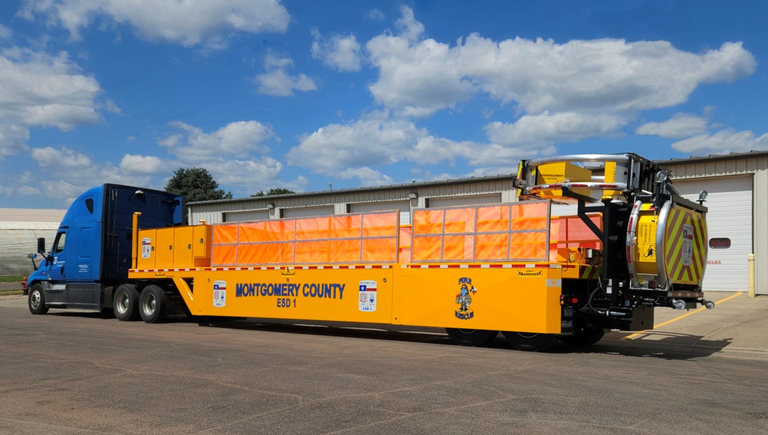 A purpose-built blocker vehicle designed to block multiple lanes of traffic and deflect or redirect oncoming vehicles