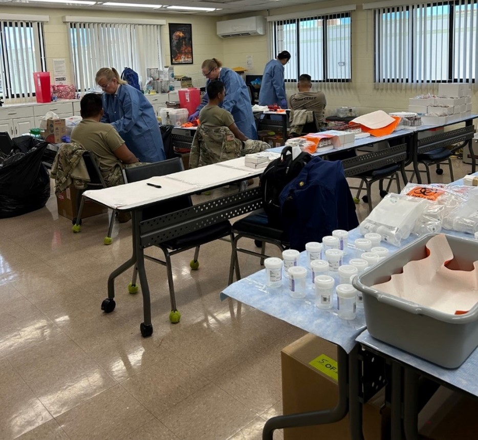 phlebotomists taking blood samples from response workers.