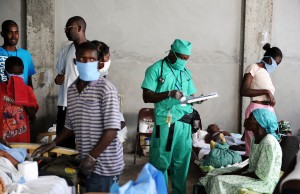 Doctor treating patients at a Cholera Treatment Center in the Artibonite department of Haiti. Photo by Kendra Helmer/USAID.