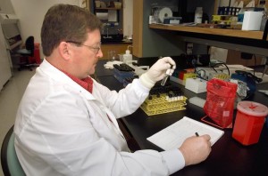 male scientist working in lab