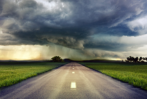 road and storm cloud sky