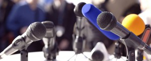 microphones set up for a news conference