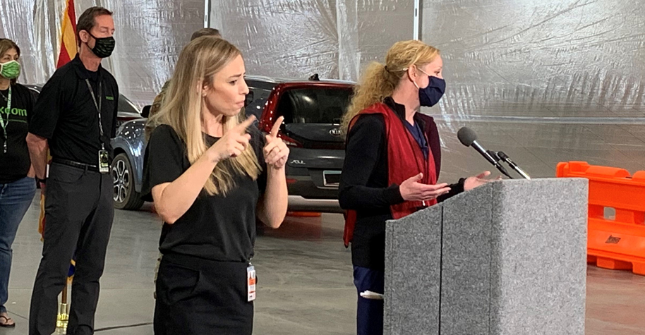 An American Sign Language interpreter at a press conference.