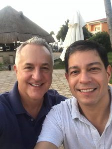 Victor and his husband Doug Hambrick in Playa del Carmen, Mexico.
