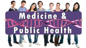 people holding a sign reading Medicine & Public Health with DNA