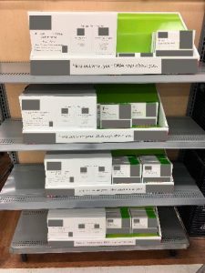 a shelf of DTC genetic testing kits