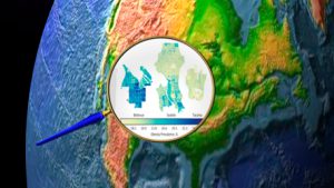 a maginfying glass zooming in on precision data on a globe