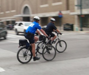 two bicycle-mounted police officers