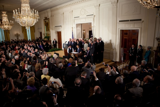 President Obama signing the health insurance reform bill, March 23, 2010.