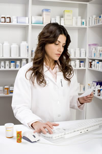 Pharmacist examining a perscription