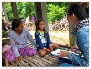 A nine-year old girl and her grandmother being interviewed in Svay Rieng province about her knowledge on HPV vaccine