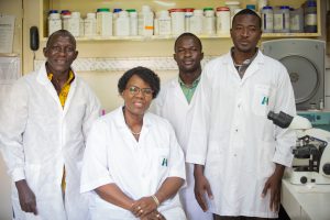 Rasmata with members of her laboratory, R to L : Mamadou Tamboura, Rasmata, Mamadou Baduon and Issa Tonde. (Photograph by Serge Ismael Ouédraogo, HID)