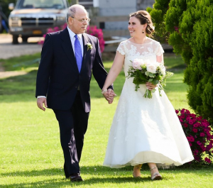 Leslie Ross with her father on her wedding day