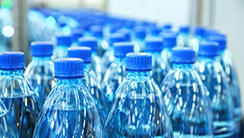 Bottles of water on a conveyor belt.