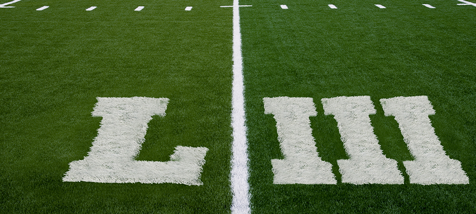 The Roman numerals LII spray-painted on a football field
