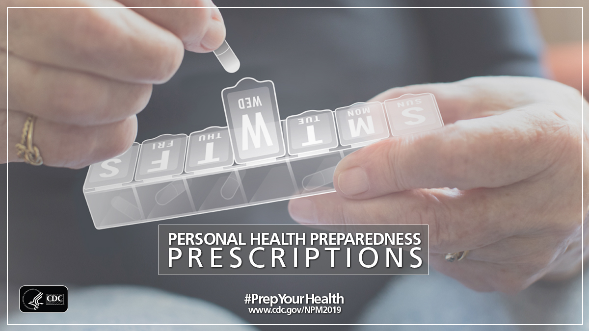 Woman putting medication in a pill organizer.